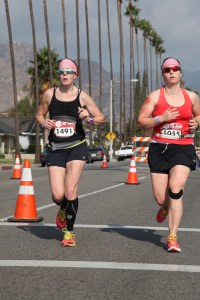 Krista Miner Sidwell and Natalie Brown in the last half mile of the 2014 Canyon City Marathon sprinting for the finish.